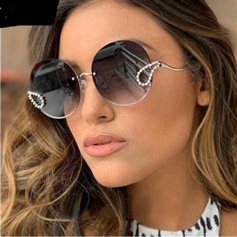 Women's Designer and Luxury Sunglasses .